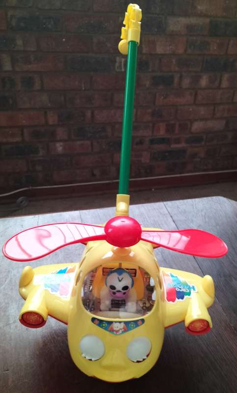 Push-a-long toy plastic helicopter