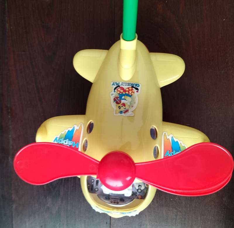 Push-a-long toy plastic helicopter