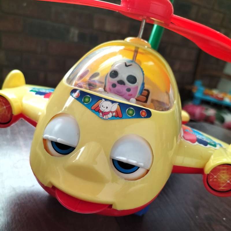Push-a-long toy plastic helicopter