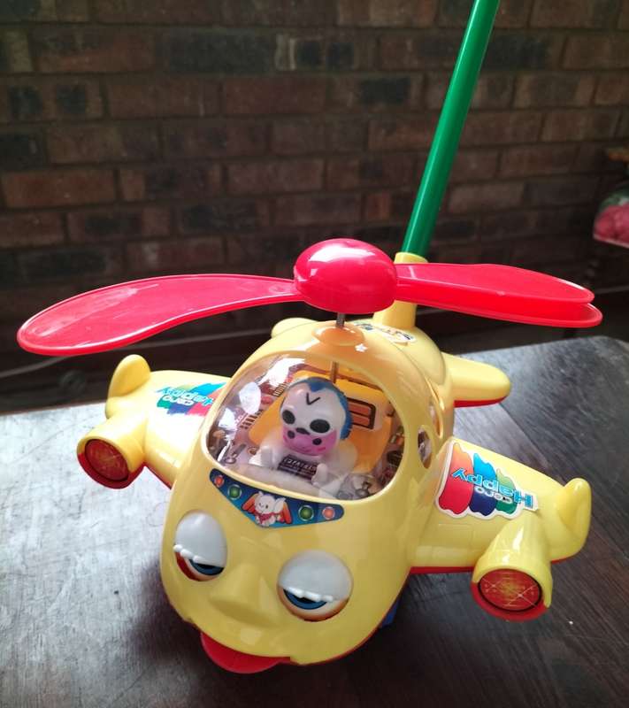 Push-a-long toy plastic helicopter