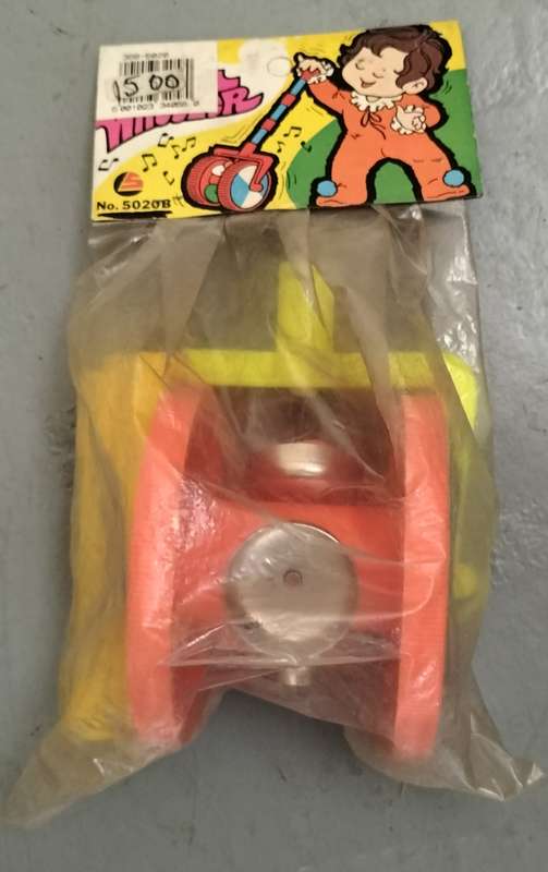 New old stock - plastic musical wheeler (still wrapped)
