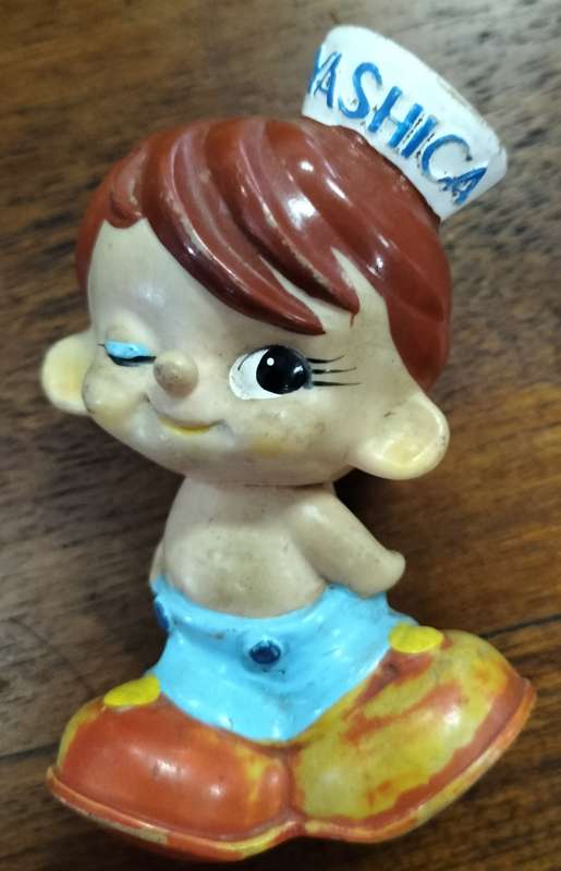Vintage Yashica advertising doll