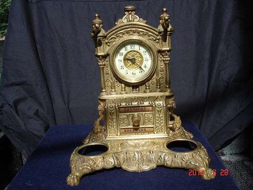 Brass calendar clock