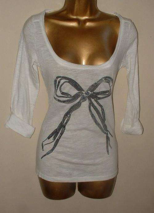 12 / 36  New White long sleeve top with decorative silver bow detail - so pretty
