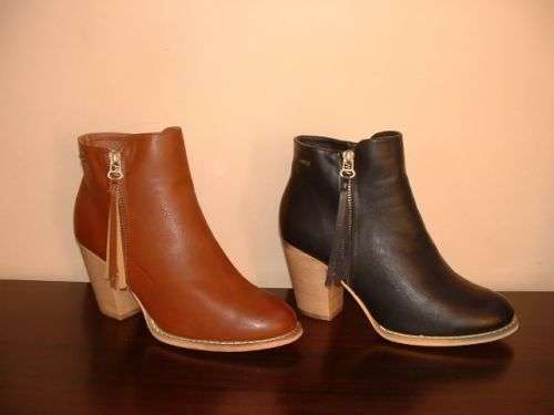 Size 7 or 8 BLACK heeled ladies ankle boots designer is Mtng Mustang.