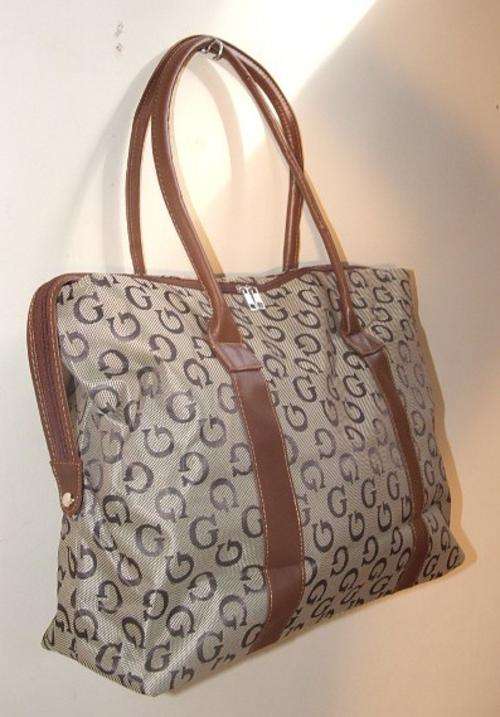 Ladies travel or handbag = BLACK BROWN OR GREY  very celebrity style Bargain dont miss it