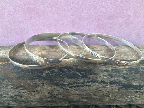 STERLING SILVER BRACLETS.