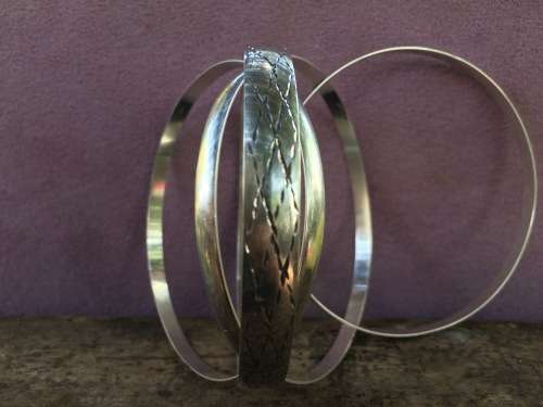 STERLING SILVER BRACLETS.