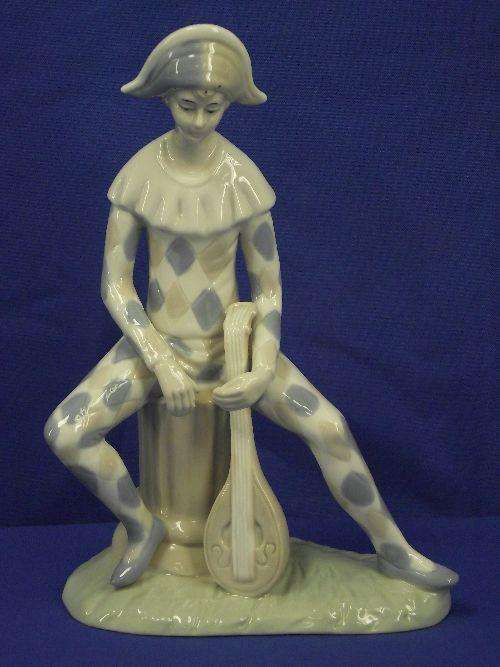 A TIVOLI CERAMIC FIGURE SIZE; 22CM.!!!