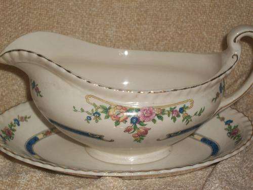 PORCELAIN GRAVY BOAT AND SAUCER. JOHNSON ENG