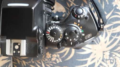 Nikon F4 Pro SLR for sale with leather camera bag