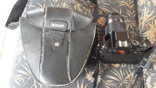Nikon F4 Pro SLR for sale with leather camera bag
