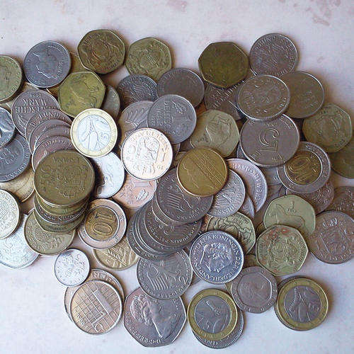 Over R650.00 worth of currency coins from around the world !!!!