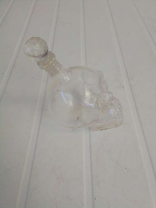 SKULL SHAPED BOTTLE AND GLASSES