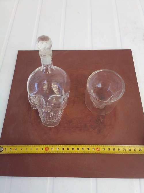 SKULL SHAPED BOTTLE AND GLASSES