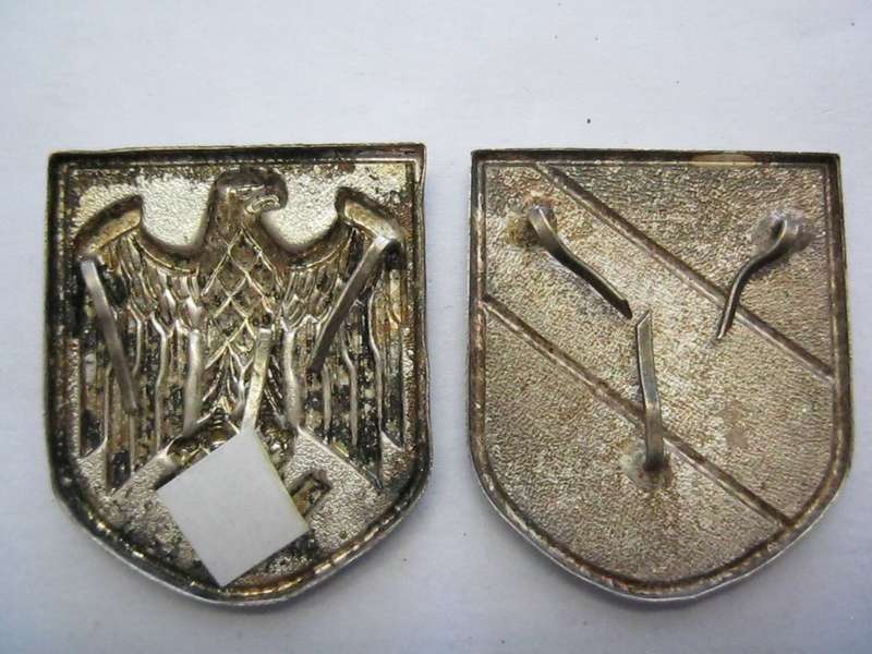 WW 2 Pith Helmet Badges.