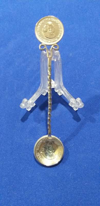 Very nice teaspoon made with a 1961 10 cent and 1963 5 cent. 'Silver' stamp on the handle