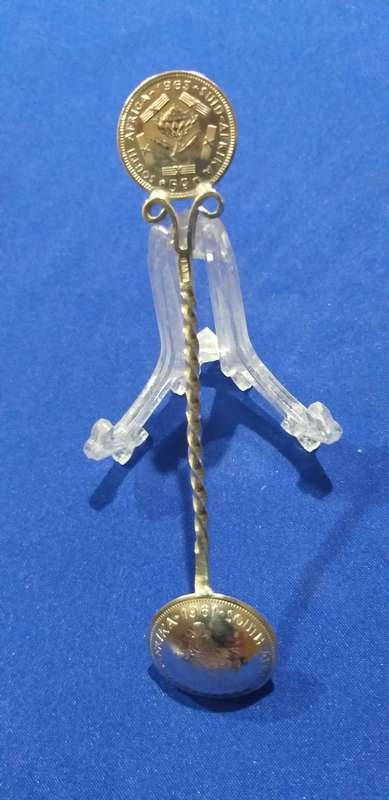 Very nice teaspoon made with a 1961 10 cent and 1963 5 cent. 'Silver' stamp on the handle