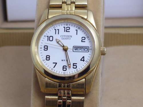 2012 Citizen analog quartz CTZ-6618 womens time piece in original box with papers.