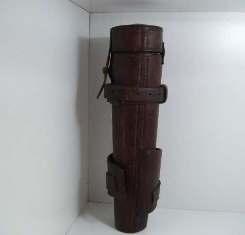 Antique saddle flask glass with leather holder.