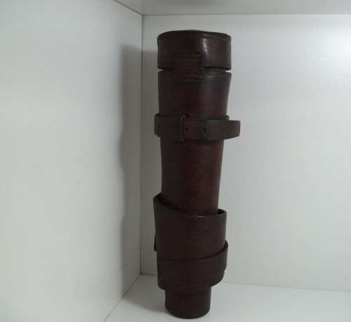 Antique saddle flask glass with leather holder.