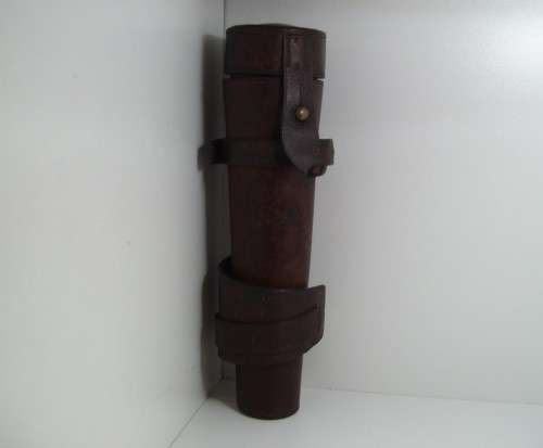 Antique saddle flask glass with leather holder.