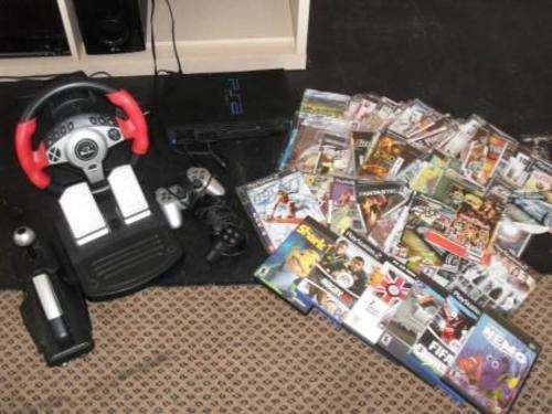 **SONY PS2 + 75 GAMES+2 CONTROLLS+MEMORY CARD+ STEARING WHEEL+PEDALS+GEAL SHIFTER