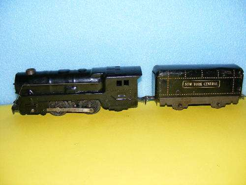 O-Gauge Tinplate loco, tender, tanker wagon.