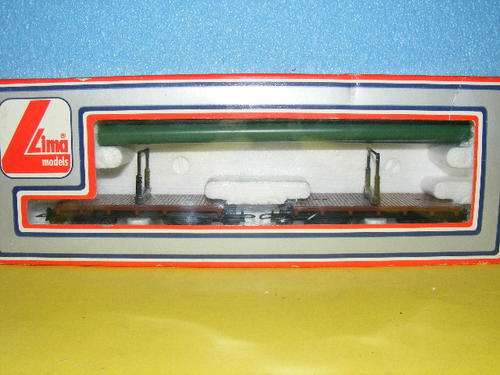 Lima HO Twin Flatbed with pipe Load.