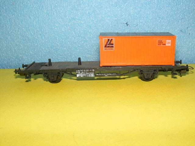 Lima HO Flatbed with container.