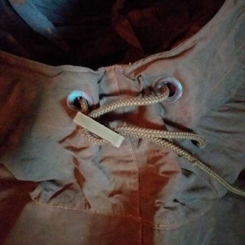 Poncho/Ground sheet with carrier and kidney pouches.