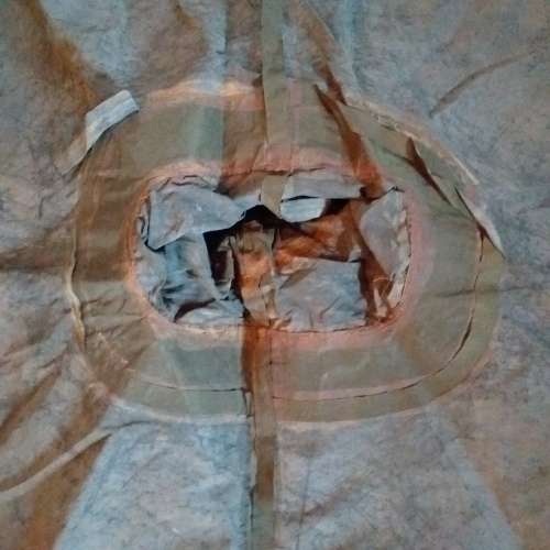 Poncho/Ground sheet with carrier and kidney pouches.