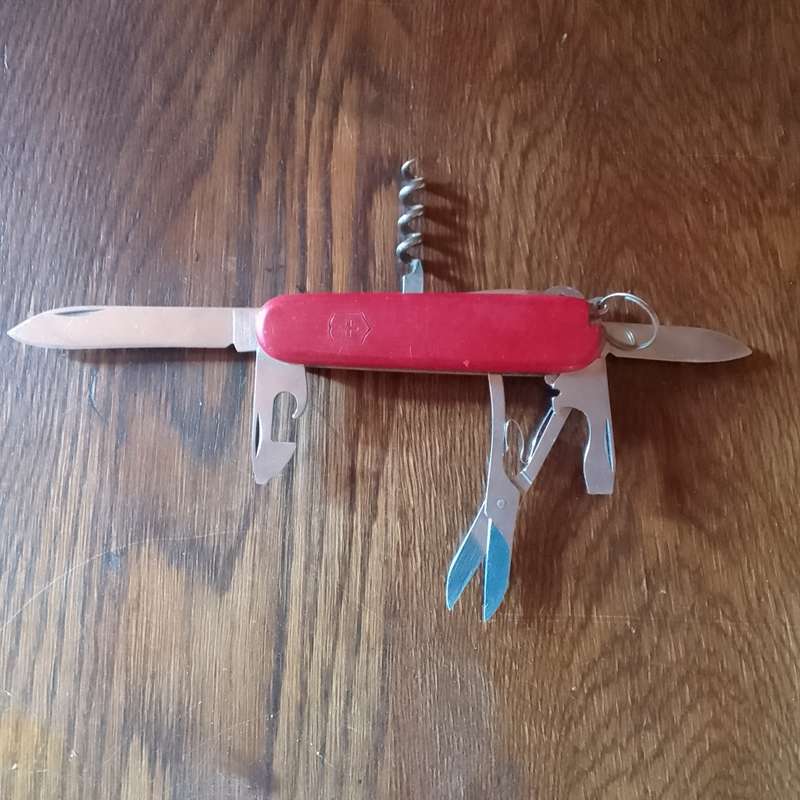 Victorinox with leather pouch.