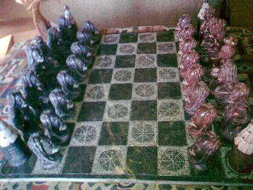 Take a look at this African Stone Chess Set. Hand Carved. For Heinrich only please