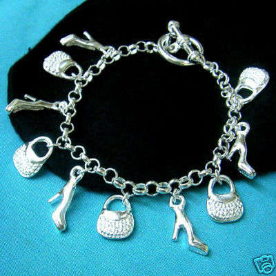New 925 Silver stamped charm bracelot with free charms