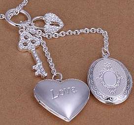 New 925 Sterling silver Double Locket necklace with free heart and key charms. 1st on R1 auctions