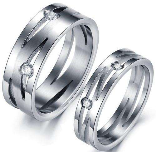 1st on BoB, Stainless steel Lovers couple rings,Bid on the Mens ring, recieve the Womans FREE.