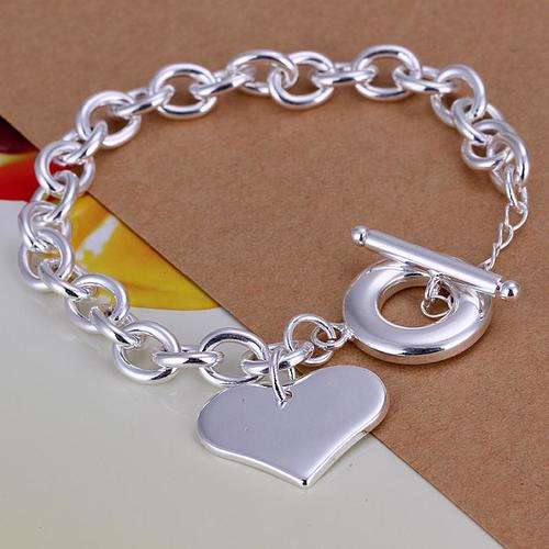 Gorgeous 925 sterling silver filled stamped heart charm bracelet. Option to add matching Necklace