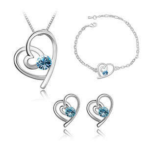 New Rhodium plated ladies earring, bracelet and pendant set with Blue Swarovski elements