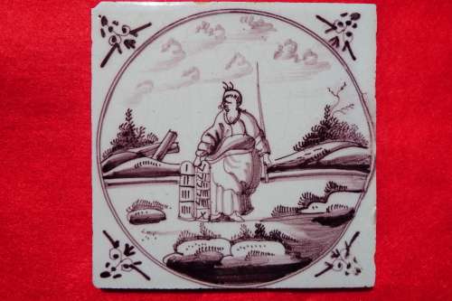 A rare `Bristol` manganese coloured `Delft` wall tile Circa 1750 Ref.#CL-10