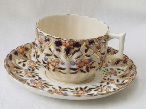 Antique  gilded porcelain duo 1889-1891 Ref. C-103