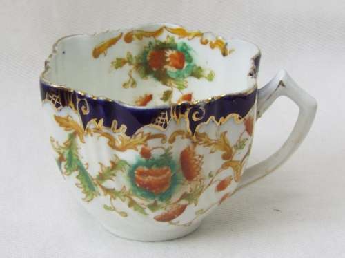 Antique gilded porcelain transfer ware and hand embellished Cup and Saucer Ref. C-104