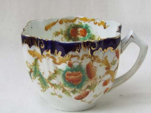 Antique gilded porcelain transfer ware and hand embellished Cup and Saucer Ref. C-104