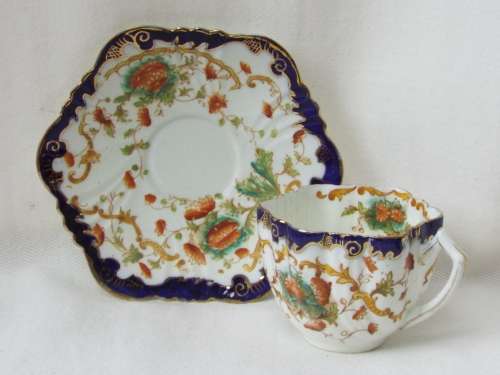 Antique  gilded porcelain transfer ware and hand embellished Cup and Saucer Ref. C-105