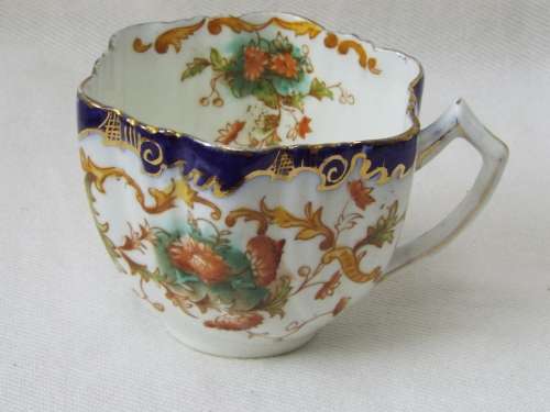 Antique  gilded porcelain transfer ware and hand embellished Cup and Saucer Ref. C-105
