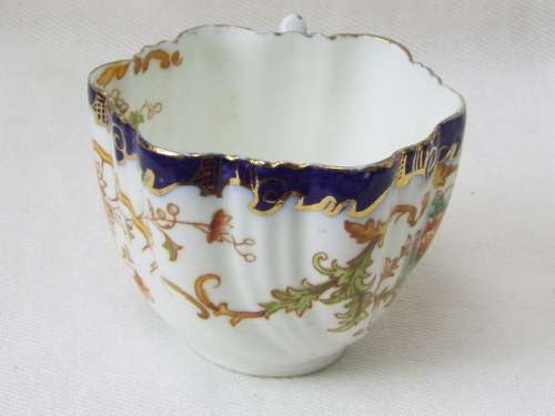 Antique  gilded porcelain transfer ware and hand embellished Cup and Saucer Ref. C-105