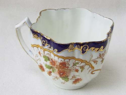 Antique  gilded porcelain transfer ware and hand embellished Cup and Saucer Ref. C-105