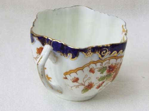 Antique  gilded porcelain transfer ware and hand embellished Cup and Saucer Ref. C-105