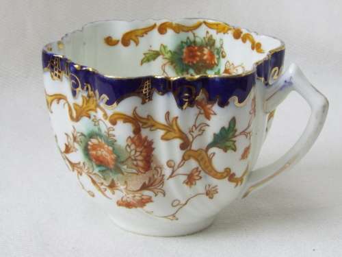 Antique  gilded porcelain transfer ware and hand embellished Cup and Saucer Ref. C-106