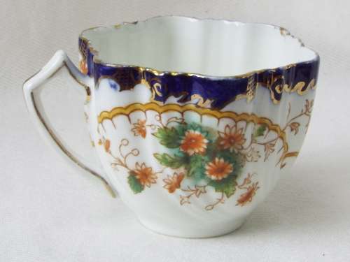 Antique  gilded porcelain transfer ware and hand embellished Cup and Saucer Ref. C-106
